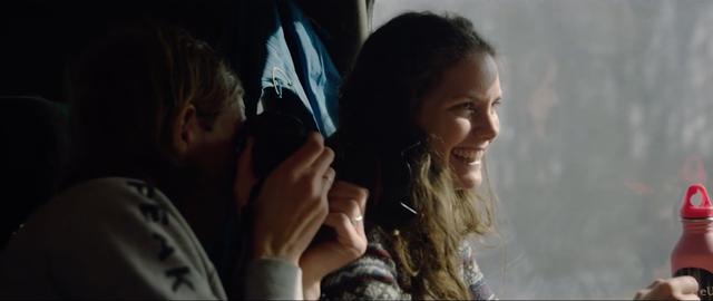 Skier Emelie Eriksson smiling in a train