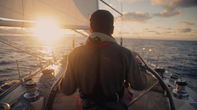 Alexander Groves sailing the boat on the open sea