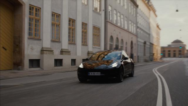 Tesla car on the road in European city